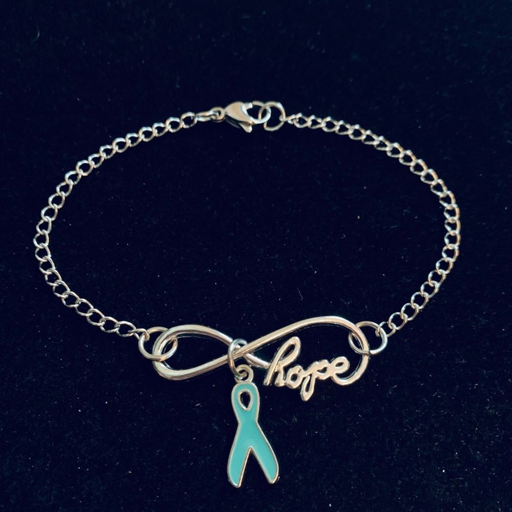 Infinity “Hope” stainless steel bracelet with teal ribbon charm